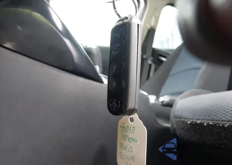 2018 Toyota Yaris Ia из США, поврежденный, VIN 3MYDLBYV5JY323621